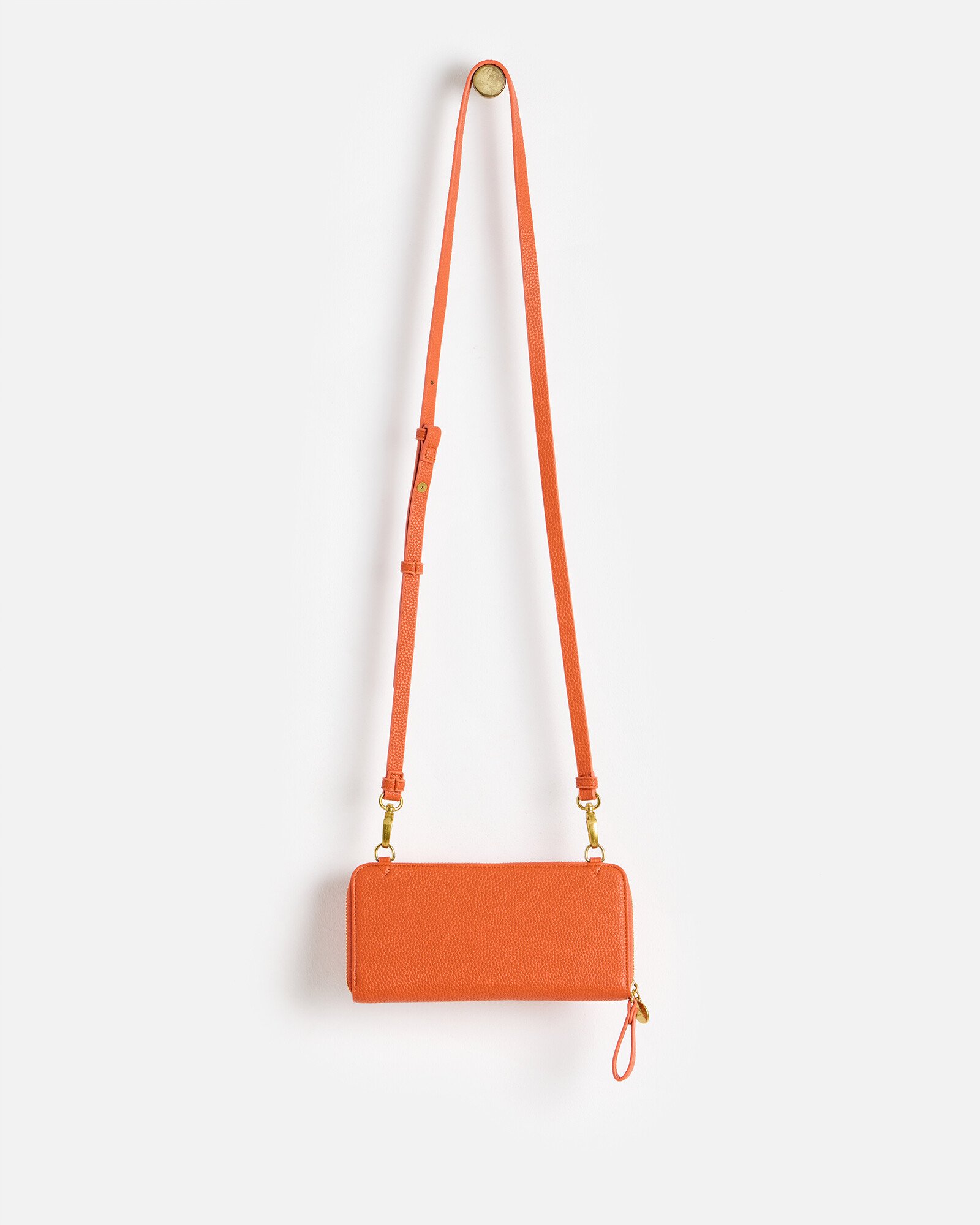 Evie Orange Crossbody Phone Bag | Oliver Bonas
