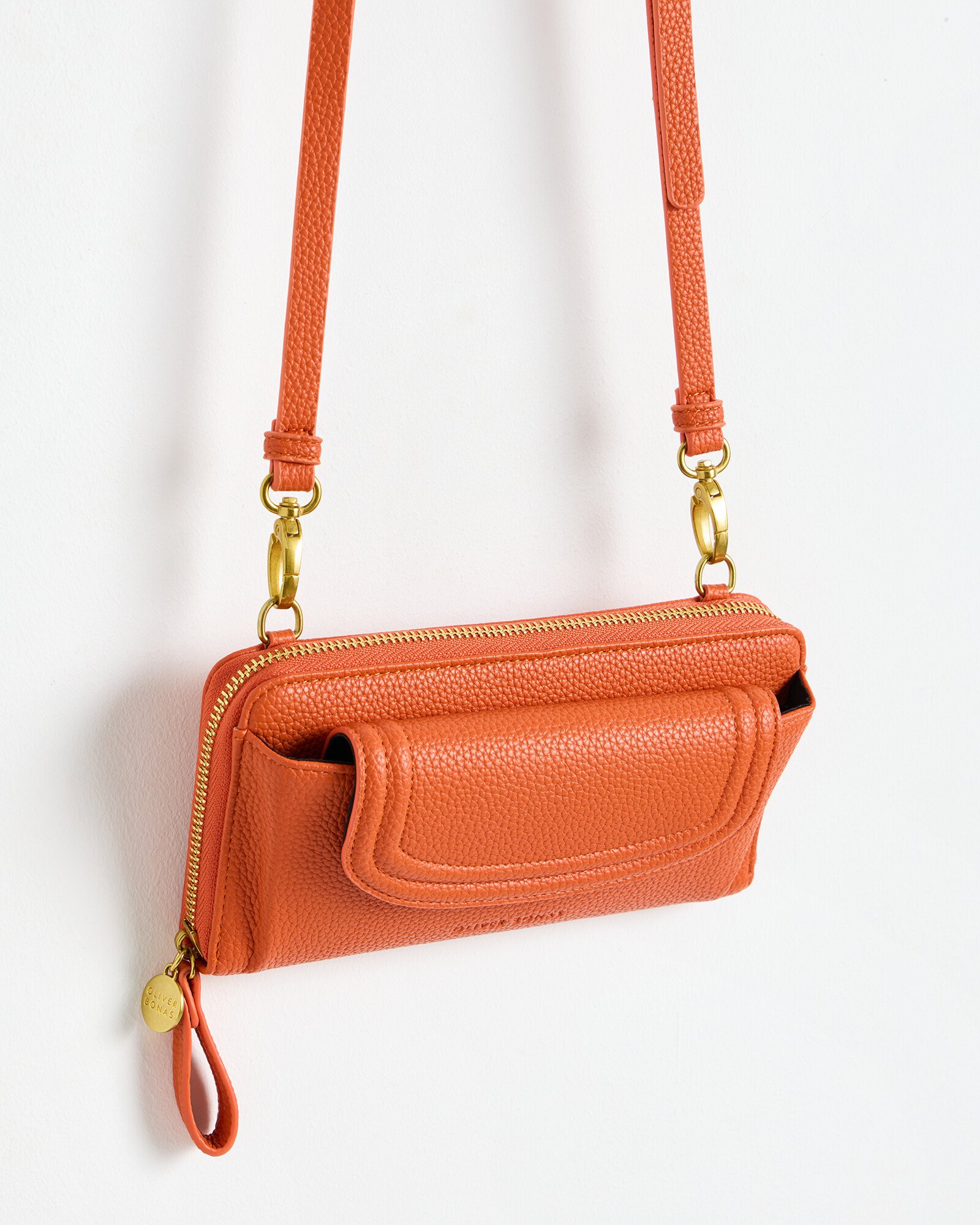 Evie Orange Crossbody Phone Bag | Oliver Bonas
